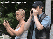 Wayne Toole (and signer) . Photo by equalmarriage.ca, 2003