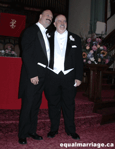 Phillip De Blieck and his husband Rev, Troy Perry (Photo by equalmarriage.ca, 2003)